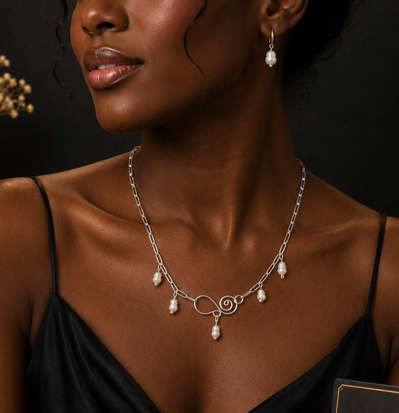 Delicate pearl swirl necklace